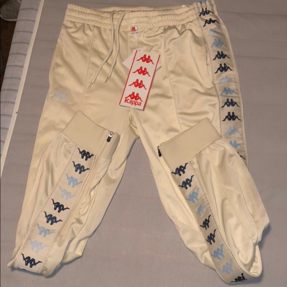 Cream kappa track pants with blue accents